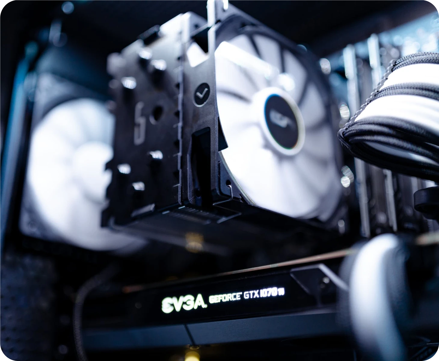 A close up of a computer case with a fan.